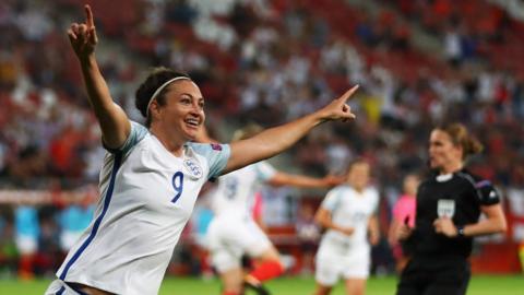 Jodie Taylor celebrates after scoing against Scotland