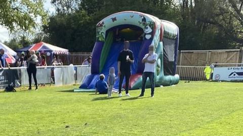 Bouncy castle on pitch at Colney Heath FC