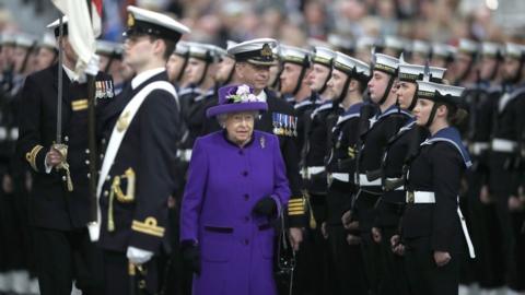 Queen Elizabeth II as she arrives for the commissioning ceremony of Britain's biggest and most powerful warship HMS Queen Elizabeth into the Royal Navy Fleet at Portsmouth Harbour