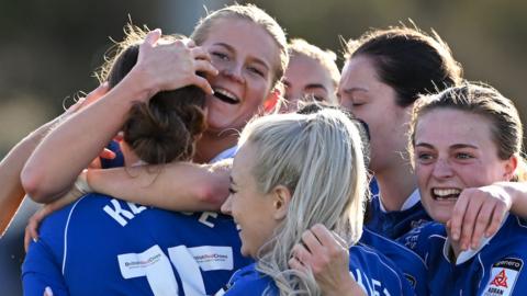 Molly Kehoe of Cardiff City Women celebrates scoring her side's second goal with team-mates