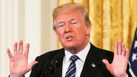 President Donald Trump delivers remarks during the Prison Reform Summit at the White House in Washington, 18 May 2018