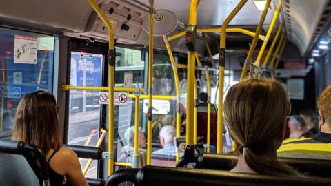 People sitting on a bus