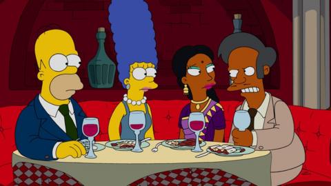 The Simpsons characters, from left to right: Homer and Marge, and Manjula and Apu