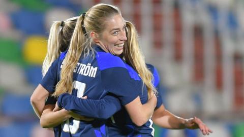 Finland players celebrate the goal of Linda Sallstrom against Georgia