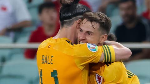 Wales' Gareth Bale and Aaron Ramsey celebrate