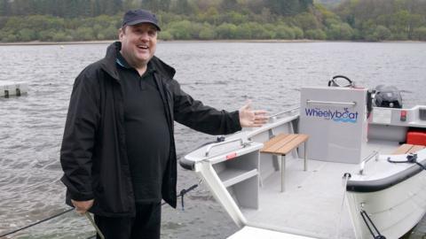 Peter Kay with the boat