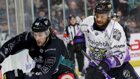 Action between Belfast Giants and Manchester Storm