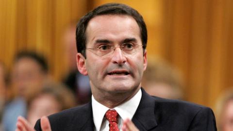 Former Canadian Transport Minister Jean Lapierre stands to speak in the House of Commons on Parliament Hill in Ottawa in this file photo taken November 16, 2005