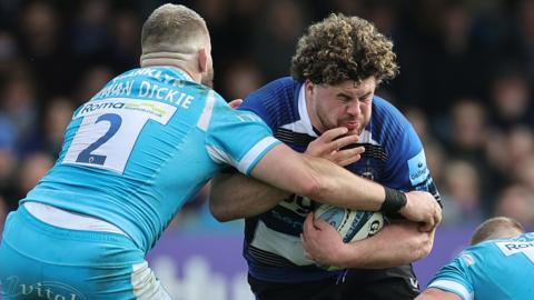 Alfie Barbeary of Bath is tackled by Luke Cowan-Dickie