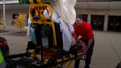 Ambulance takes voter to the polls