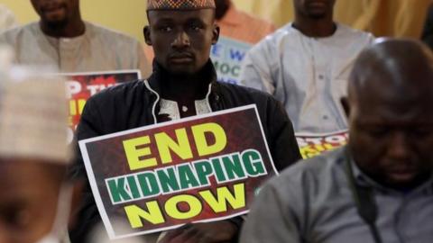 Supporters of the "Coalition of Northern Groups" (CNG) rally to urge authorities to rescue hundreds of abducted schoolboys, in northwestern state of Katsina, Nigeria on December 17, 2020