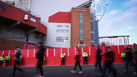 Fans arrive for FA Cup Quarter Final - Manchester United v Liverpool - at Old Trafford, Manchester