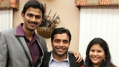 Srinivas Kuchibhotla, left, poses for photo with Alok Madasani and his wife Sunayana Dumala in Cedar Rapids, Iowa.