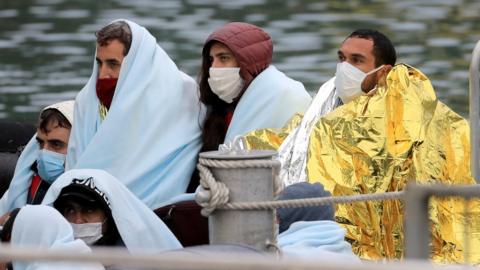 Migrants making the crossing on small boats on Friday