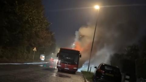 A bus on fire in Wycombe