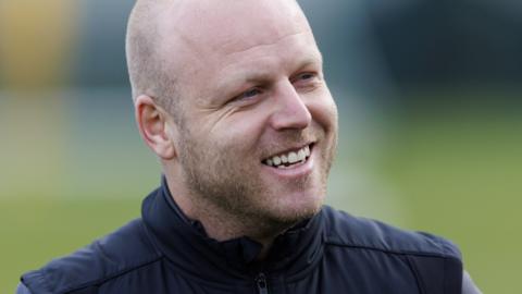 Hearts boss Steven Naismith smiles