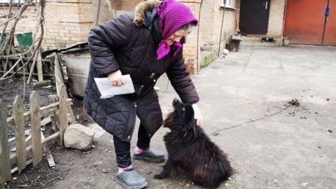 Lyubov Kolyucha and her dog Sharik