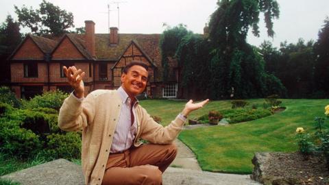 Bob Monkhouse outside Claridges in Egginton