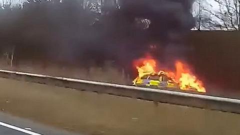 Norfolk Police car on fire on A11 Wymondham, Norfolk