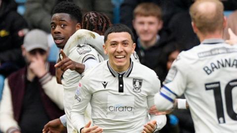 Sheffield Wednesday's players celebrate their second goal against Millwall