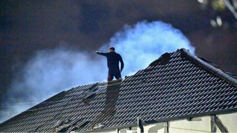 Man on roof