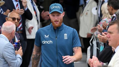 Ben Stokes walking out to congratulate the Australia players