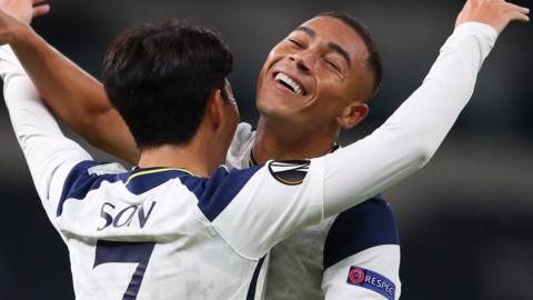 Carlos Vinicius celebrates Spurs' third with goalscorer Son Heung-min