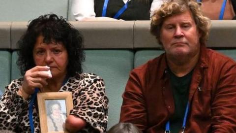 Thalidomide survivors sit in Parliament House