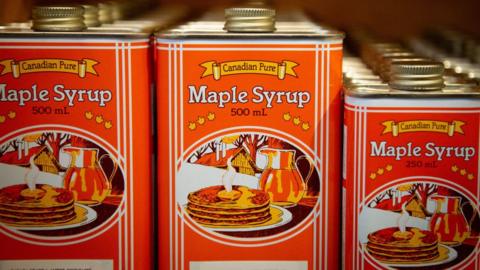 Bottles of maple syrup sit on display at a gift shop in Vancouver, British Columbia