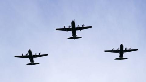 Three Hercules flying in formation