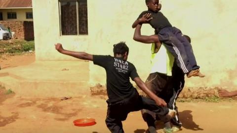 Children practicing stunts