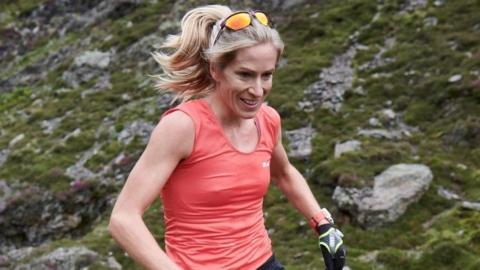 Beth Pascall running across one of the fells as part of the Bob Graham Round