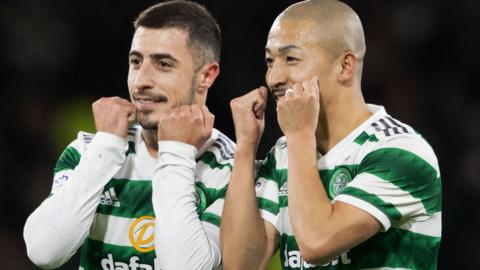 Josip Juranovic and Daizen Maeda celebrate the latter's goal for Celtic against Kilmarnock