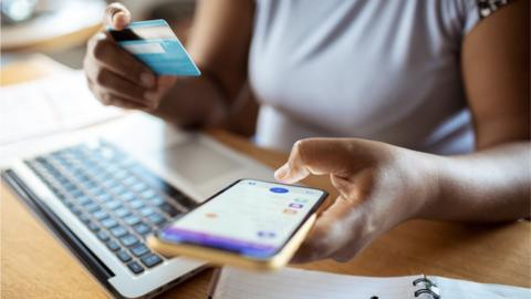 Woman looking at savings