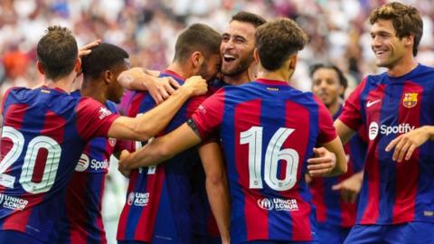 Barcelona players celebrate Fermin Lopez's goal against Real Madrid