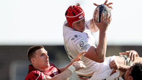 Andrew Conway challenges Thibaud Flament during last season's knockout game at Thomond Park