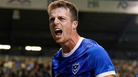 Conor Shaughnessy celebrates his late winner for Portsmouth