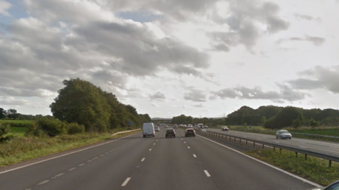 Cars on south-bound carriageway of M5 near Tiverton