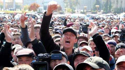 Protesters gather during a rally demanding the impeachment of Kyrgyzstan's President Sooronbay Jeenbekov in the central square of Ala-Too in Bishkek, Kyrgyzstan, 7 October 2020