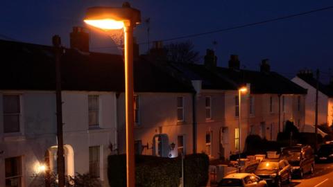 A street light and terraced housing