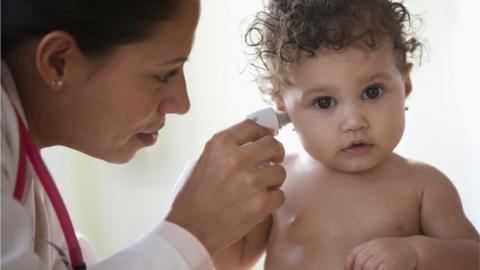 Doctor with baby