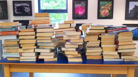 Libraries across Northern Ireland will reopen with a new book and collect service.