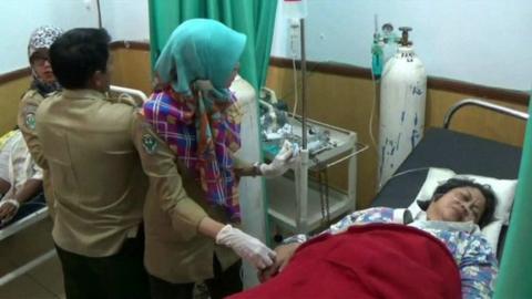 A woman in hospital in Indonesia