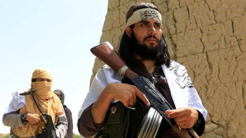 Taliban fighters seen during a ceasefire in Nangarhar province, Afghanistan, 16 June 2018