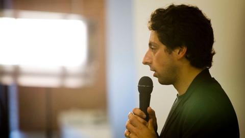 Sergey Brin with microphone.