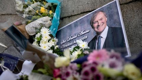 Memorial flowers to Sir David Amess