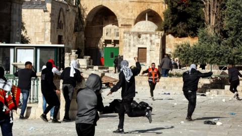 Palestinians clash with Israeli police in the al-Aqsa Mosque compound on 22 April 2022