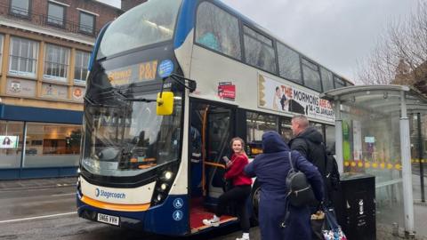 Stagecoach bus with passengers getting on