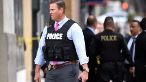 Police officers outside the Scientology centre on Wednesday