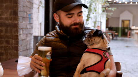 Thomas McAuley and dog Jo in White’s Tavern